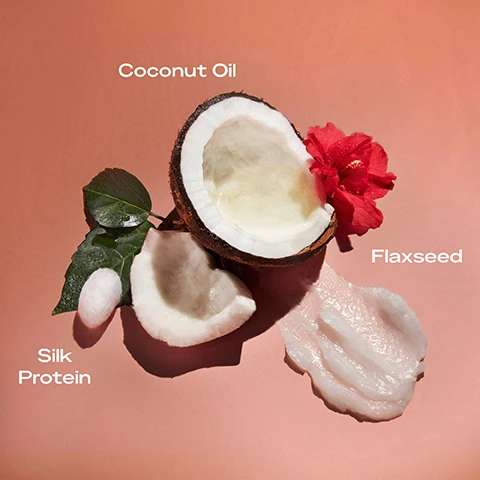 Image 1 - A halved coconut with visible coconut flesh, a pink flower, and green leaves,
Image 2 - A vibrant red hibiscus flower is placed next to coconut shells and coconut pieces on a soft pink background, with the text COCONUT OIL HIBISCUS FLOWER SHEA BUTTER displayed above.