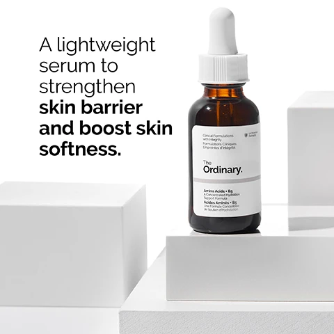 Image 1 - A dark amber glass bottle of serum with a dropper sits on a white surface, accompanied by text that reads a lightweight serum to strengthen skin barrier and boost skin softness, The Ordinary.
Image 2 - A dropper releasing a clear liquid into a shallow dish, with text that states Betaine provides skin moisturisation and Panthenol has been shown to reduce transepidermal water loss.
Image 3 - A woman with dark hair is lightly touching her cheek with one hand while looking slightly to the side; text next to her reads Apply a few drops to the face in the morning and evening.
Image 4 - A droplet of a clear, viscous substance is shown with the text Water-based serum beneath it.
Image 5 - Three horizontal sections showing skincare products: the top section labeled PREP features cleansers and toners, the middle section labeled TREAT displays various serums and oils with a highlighted water-based serum, and the bottom section labeled SEAL includes suspensions, moisturizers, and SPF, each section illustrated with corresponding product textures.