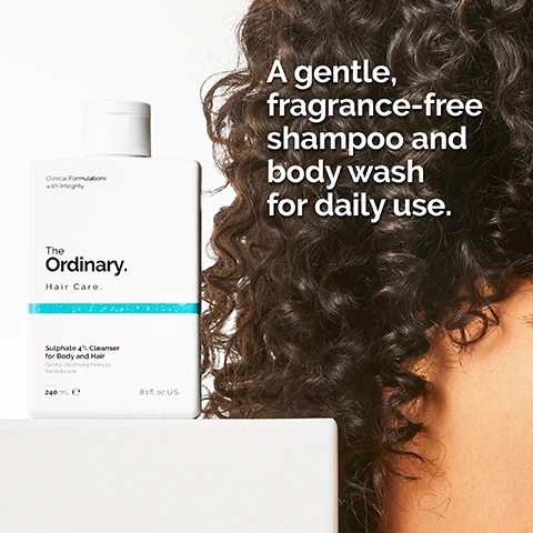 Image 1 - A bottle of The Ordinary shampoo and body wash is displayed next to a person with curly hair, and the text reads A gentle, fragrance-free shampoo and body wash for daily use.
Image 2 - A person is holding a bottle of The Ordinary hair care product, pouring a light gel texture onto their palm, with the text nearby stating 4% SLES-2 provides a refreshing and moisturizing clean for skin and scalp and Light gel texture.
Image 3 - Close-up of wet, dark hair being massaged by two hands with the text Work into hair and body. Rinse. displayed below.