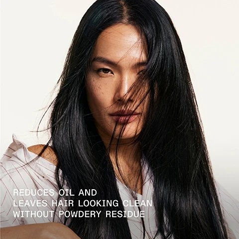 Image 1 - A woman with long, black hair partly covering her face, wearing a white and striped shirt, with the text that reads reduces oil and leaves hair looking clean without powdery residue.
Image 2 - A hand holds an OLAPLEX No. 4D Clean Volume Detox dry shampoo bottle, with the text 100% SAW NO WHITE RESIDUE* *In an independent consumer perception study of 30 participants after 3 consecutive use displayed above and below the bottle.
Image 3 - Image shows a split comparison of hair before and after treatment; on the left, hair appears flat with visible scalp, and on the right, hair looks voluminous and healthy with smooth bangs. Visible text includes BEFORE, AFTER, UNTETCHED IMAGES, and *Results may vary. Results achieved by dry cleansing with N°4D Clean Volume Detox Dry Shampoo and applying OLAPLEX N°7 Bonding Oil™ to finish.
Image 4 - Image shows two side-by-side comparisons of hair before and after using hair products, with BEFORE on the left and AFTER on the right; visible text includes UNTOUCHED IMAGES, *Results may vary. Results achieved by dry cleansing with N°4D Clean Volume Detox Dry Shampoo and applying OLAPLEX N°7 Bonding Oil™ to finish.
Image 5 - Image shows two OLAPLEX hair care products on a light background: a white bottle of OLAPLEX No. 4D dry shampoo labeled CLEAN VOLUME DETOX on the left and a small yellow bottle of OLAPLEX No. 7 bonding oil on the right, with accompanying text Add OLAPLEX No. 7 for Healthy Shine, Reduce Oil + No Residue, and Boost Shine + Softness.