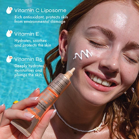 Image 2 - A smiling woman with reddish hair applies white cream to her cheek, holding a peach-colored tube that reads Vitamin Base Vitamin Enriched Glow Primer SPF 45 UVA UVB Broad Spectrum High Protection Suncare Solaire Haute Protection FRAGRANCE FREE Formulated with Antioxidants + Vita10some Poid Net Wt 40g e 1.4 oz, with additional text overlays on the left stating C Vitamin C Liposome Rich antioxidant, protects skin from environmental damage, E Vitamin E Hydrates, soothes and protects the skin, and B5 Vitamin B5 Deeply hydrates, moisturises and plumps the skin, all set against a blue pool background. Image 3 - A rose gold colored tube of The Beauty Crop Vitamin Babe Vitamin Enriched Glow Primer SPF 45 is shown against a blue sky background, highlighting its features: Broad spectrum protection SPF 45, Primes and moisturises the skin, Lightweight, non-greasy and no whitecast, UVA, UVB, Broad Spectrum, FRAGRANCE FREE, High Protection Suncare Solaire Haute Protection, Formulated with Antioxidants + Vita10some™, Poid Net Wt 40g e 1.4 oz.